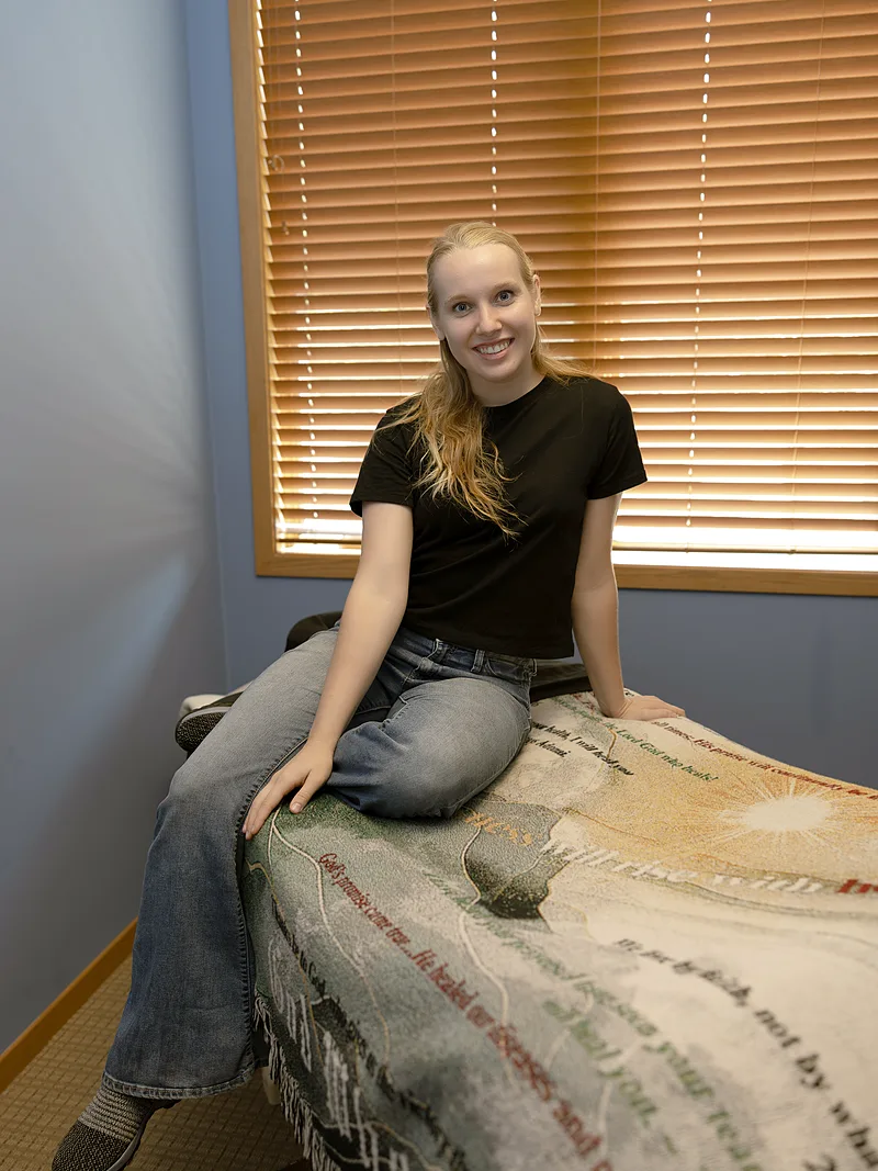 Our massage therapist in the massage treatment room